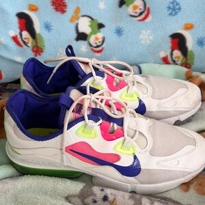 Nike White Athletic Sneakers with Blue, Pink and Neon Green Accents